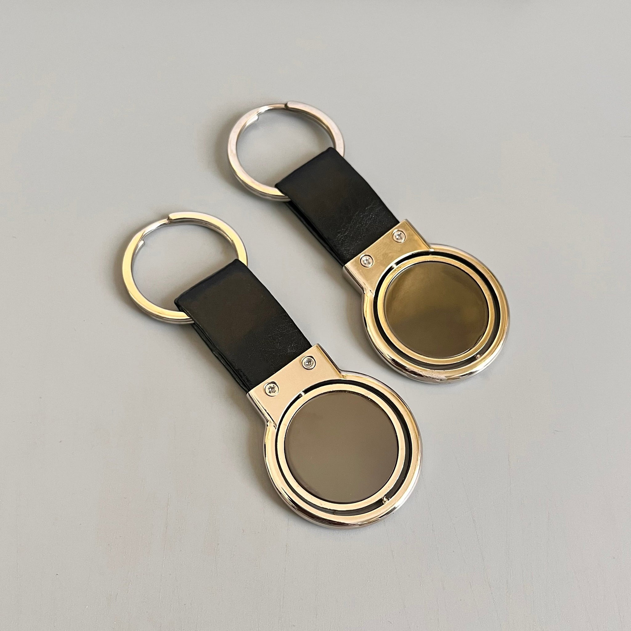 Metal Silver Rotating Keychain with Strap