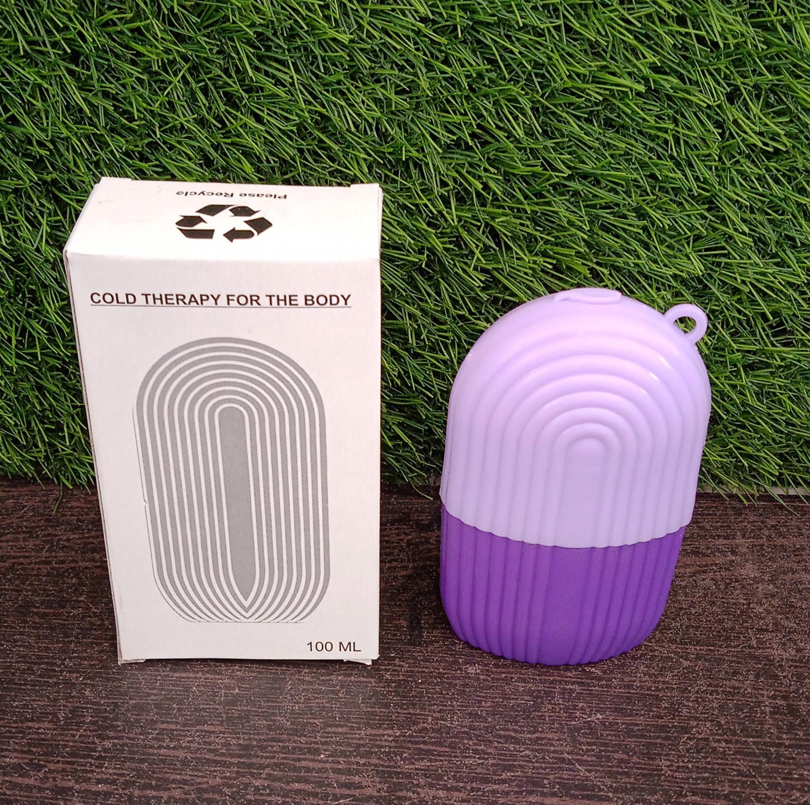 Indo Glow beauty ice roller face in purple with cold therapy for the body packaging
