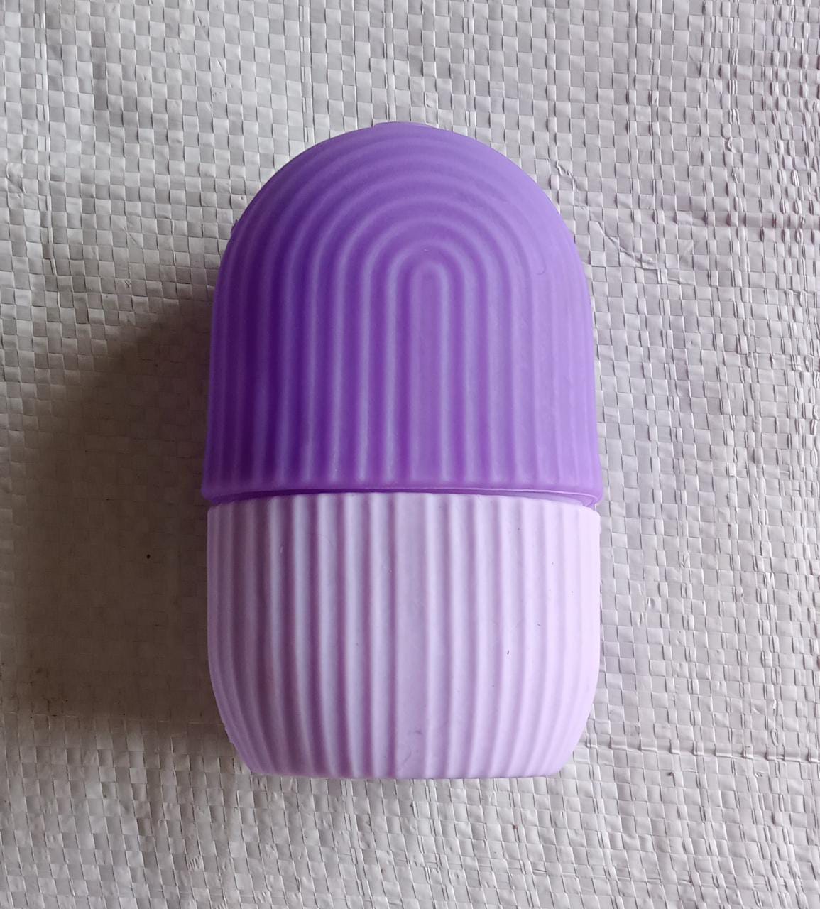 Indo Glow beauty ice roller face in purple and lavender with textured grip for skincare