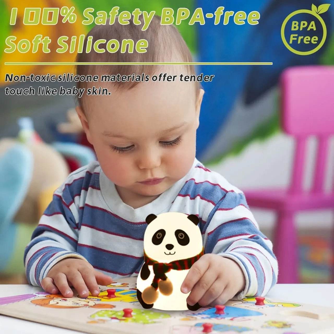 Baby playing with a BPA-free soft silicone panda night light LED on a colorful puzzle