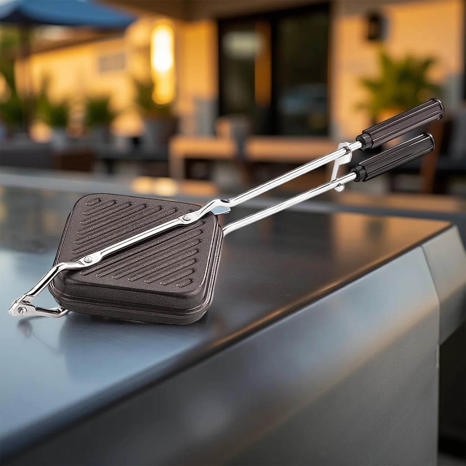Bachat Club premium aluminum sandwich toaster with long handles and non-stick surface on outdoor countertop