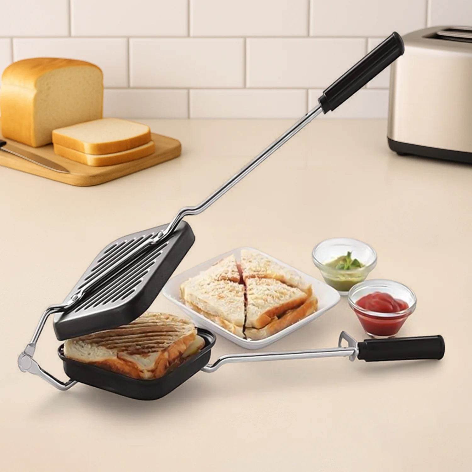 Bachat Club premium aluminum sandwich toaster with black handles grilling toasted sandwiches on kitchen counter