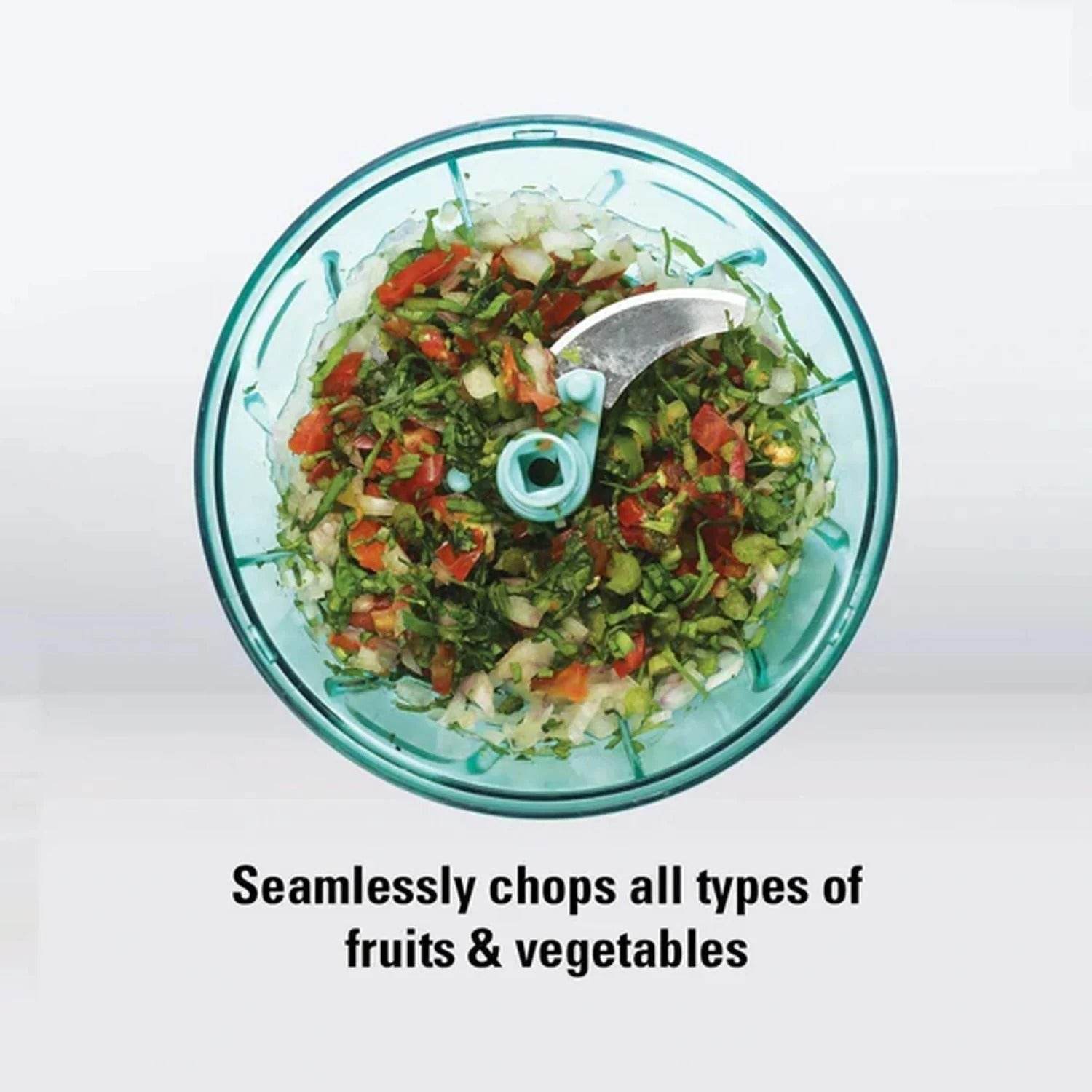 Bachat Club smart mini chopper with finely chopped mixed fruits and vegetables inside